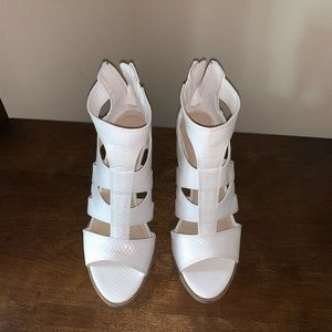 White snakeskin heels